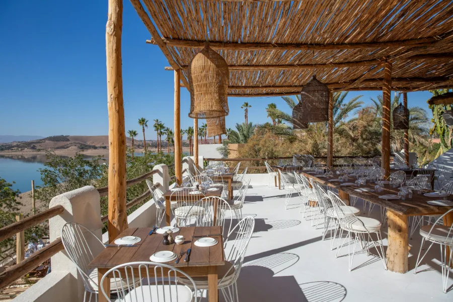 Shaded lakeside dining terrace