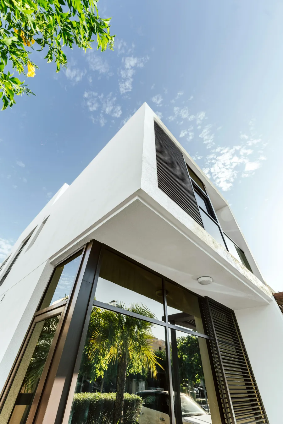 Contemporary white villa against a clear sky