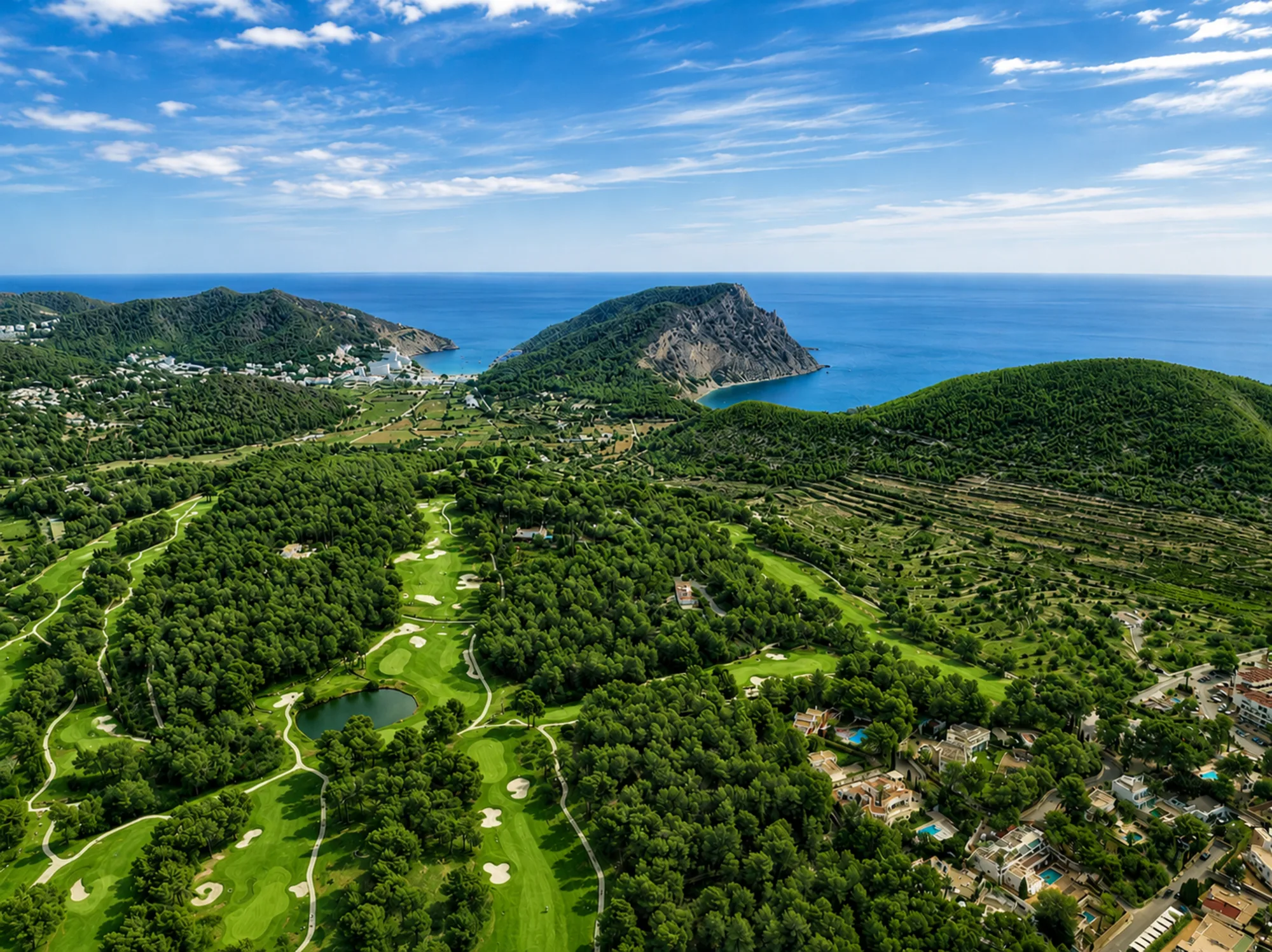 Aerial view of a Mediterranean golf and coastal landscape