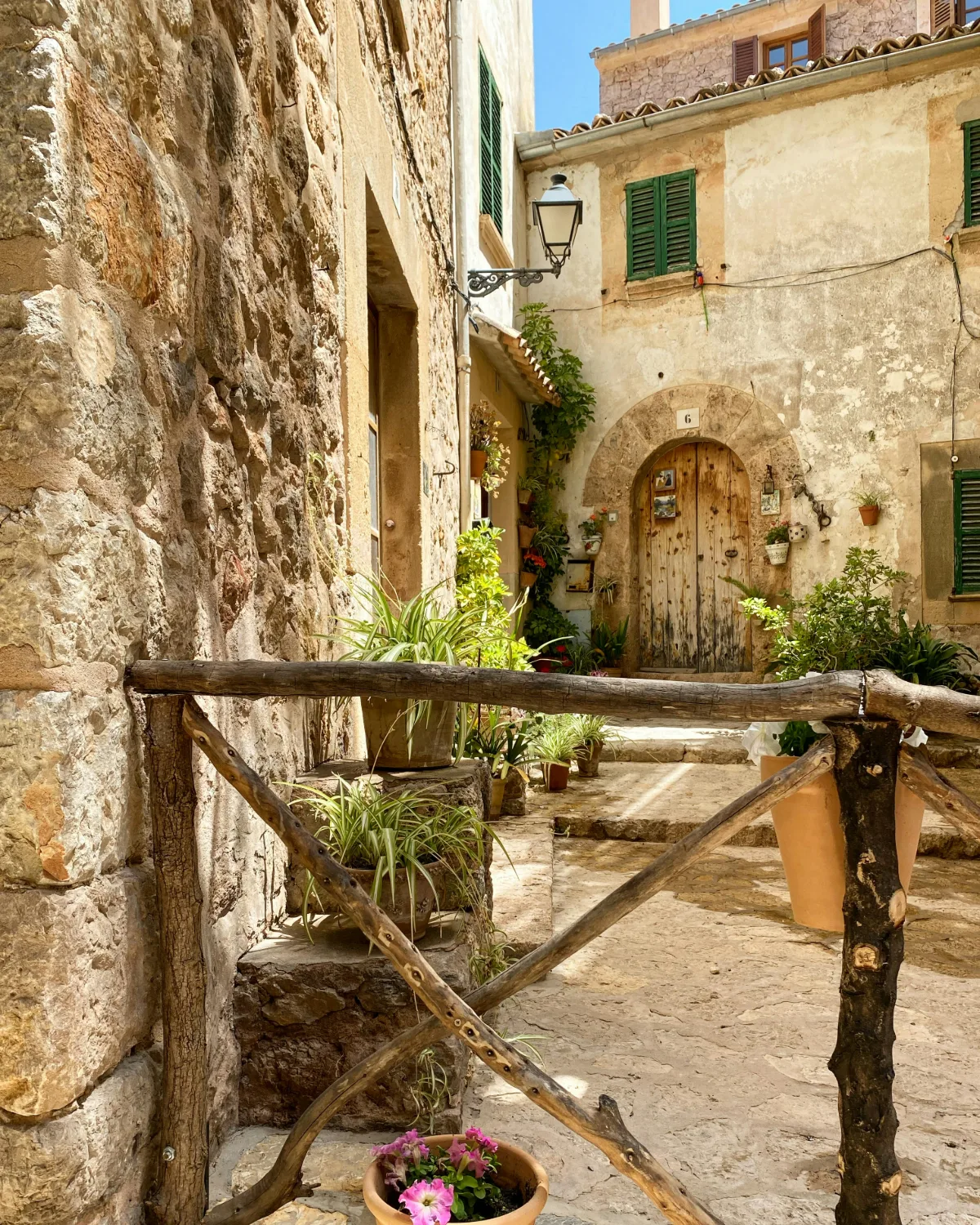 Stone lane and timber doorway in a Mediterranean village